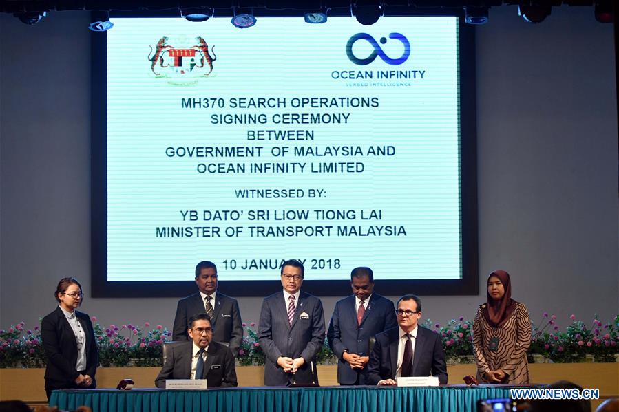 MALAYSIA-PUTRAJAYA-MH370-SEARCH OPERATIONS-SIGNING CEREMONY