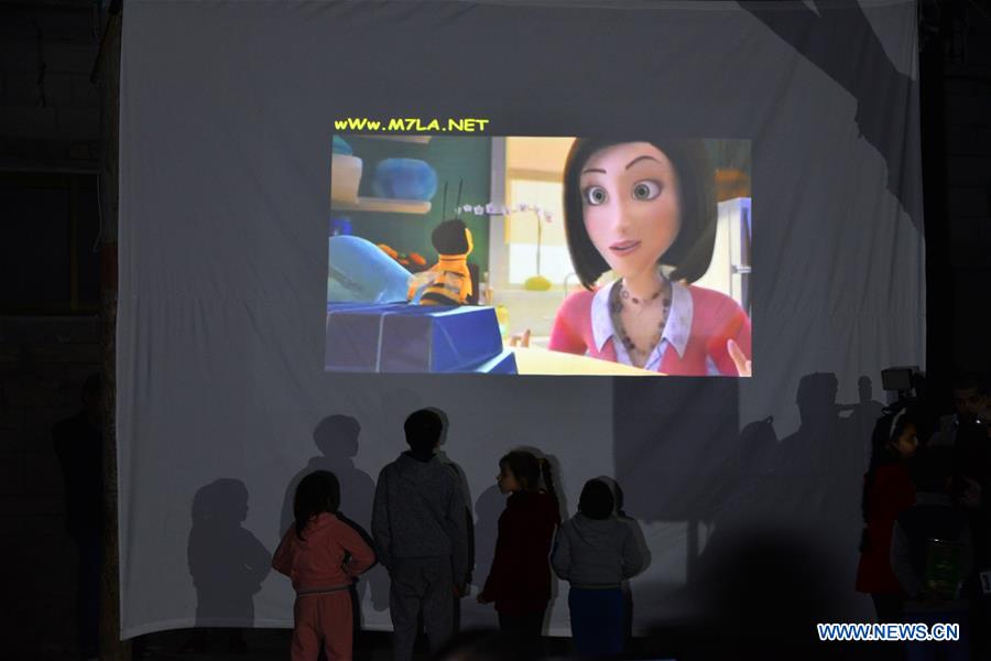 MIDEAST-GAZA-MOBILE CINEMA-CHILDREN-REFUGEE CAMPS