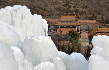 In pics: frozen waterfall in north China's Hebei