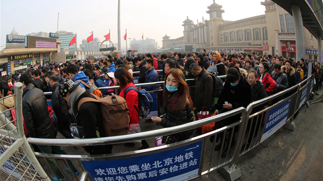 Railway stations across China witness return peak as Spring Festival comes to end